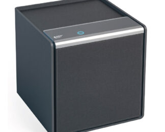 A cubic grey safe with faux-leather coated front. On top of the safe is a circle for fingerprint opening of the safe